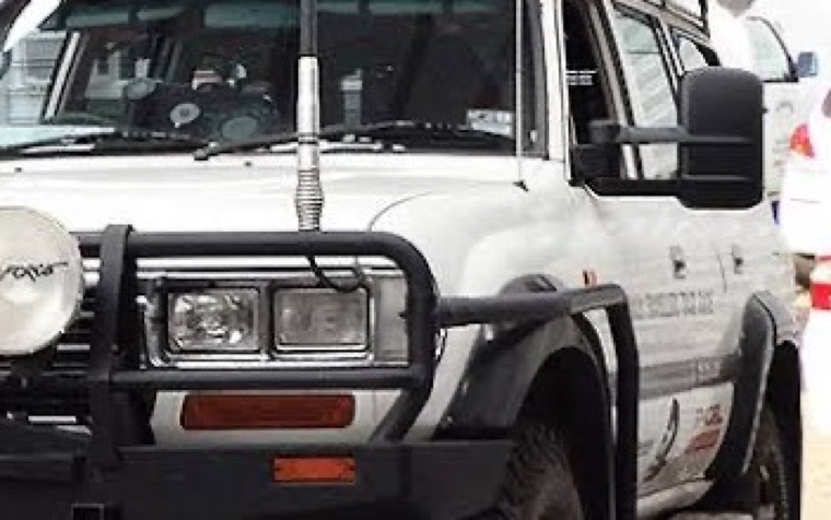 The front of a bull-barred four-wheel drive with driving lights and a snorkel